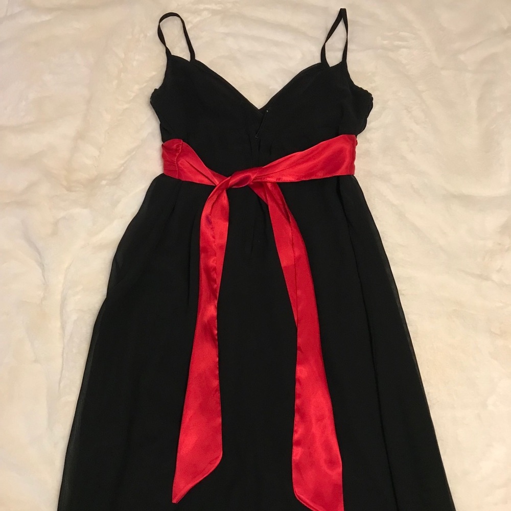 Black dress with red wrap bow